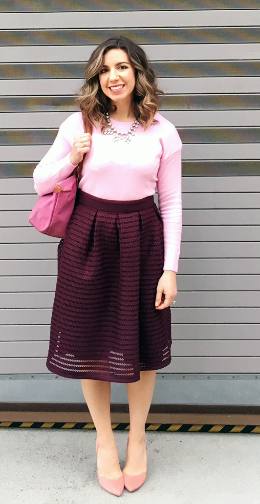 Pink Valentines Day Look featured by top US fashion blog, Glass of Glam: image of a woman wearing a pink SheIn sweater, Charlotte Russe midi skirt, pink Longchamp bag, JustFab heels, and a BaubleBar statement necklace