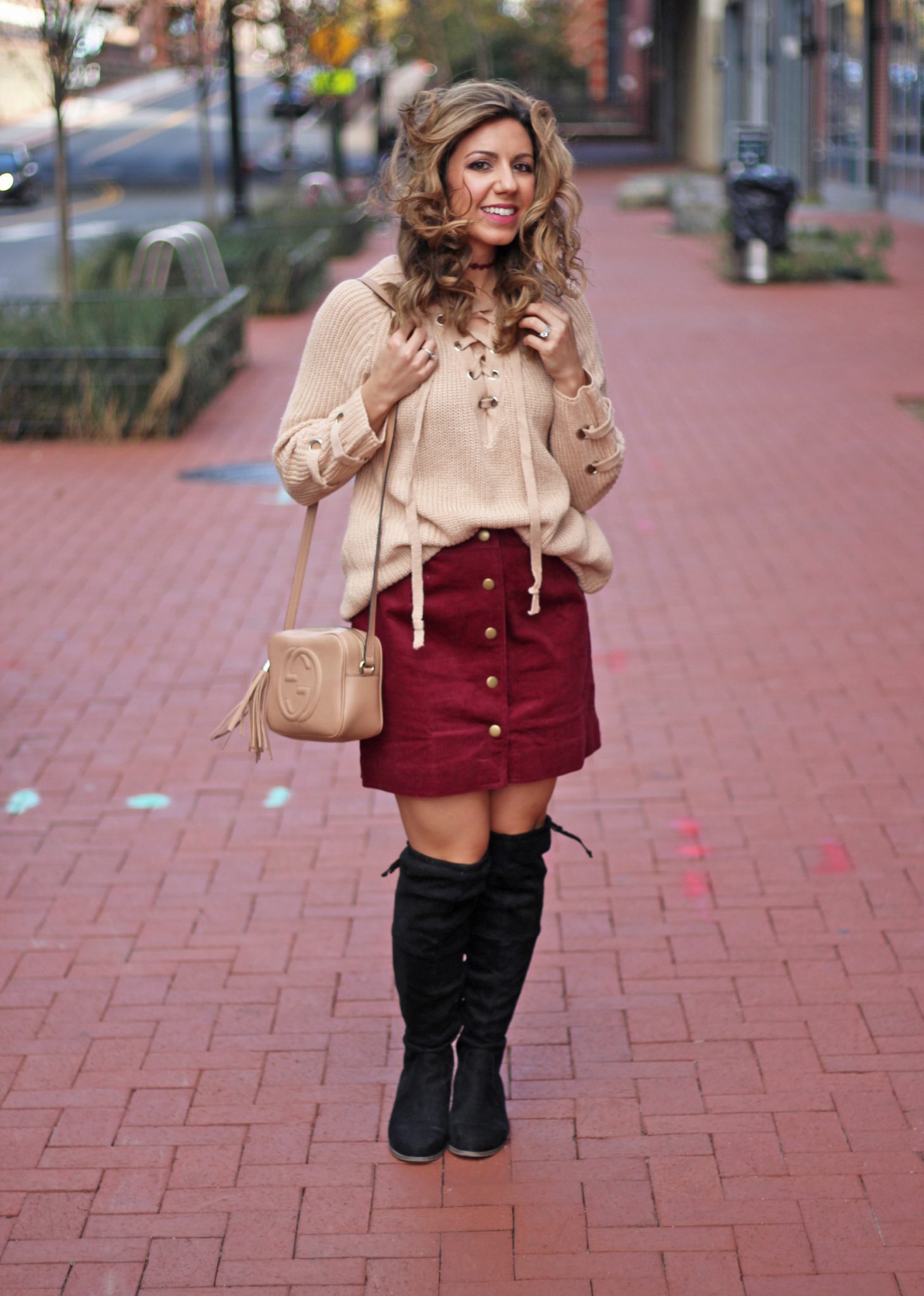 Lace up sweater and a curduroy skirt for the holidays