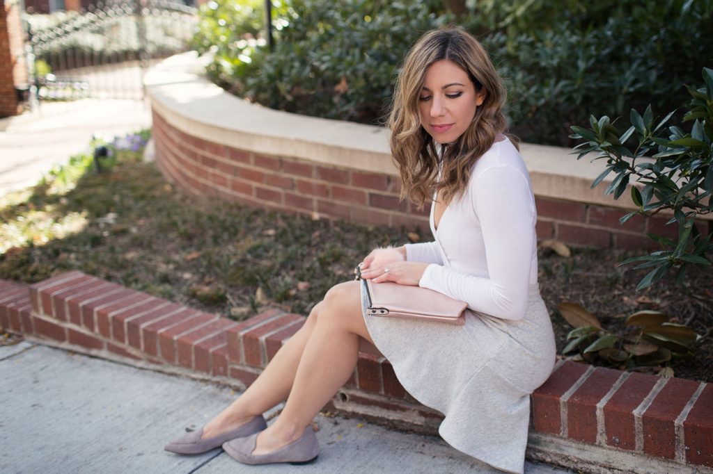 Lifestyle blogger Roxanne of Glass of Glam wearing an Anthropologie flounce skirt, asos bodysuit, M.Gemi flats, and a JustFab bag and talkinga bout ways to brighten your day