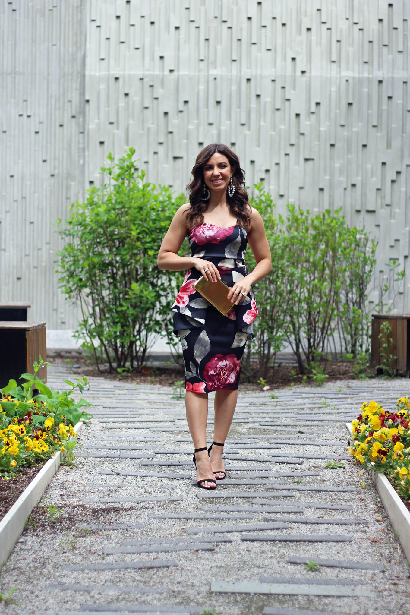 Lifestyle Blogger Roxanne of Glass of Glam wearing a floral Boohoo dress