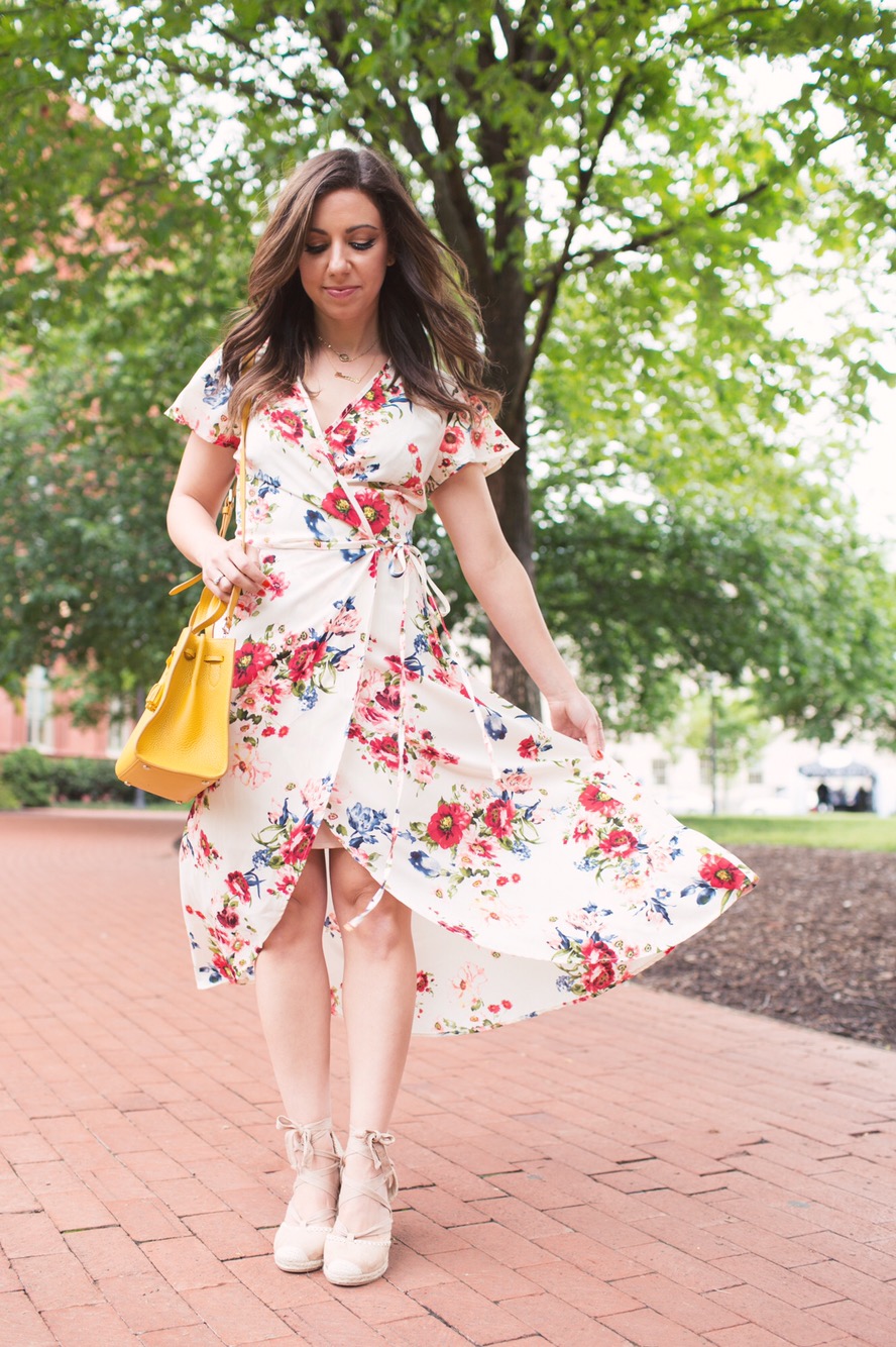 Lifestyle blogger Roxanne of Glass of Glam wearing a Xehar floral wrap print dress and lace up espadrilles