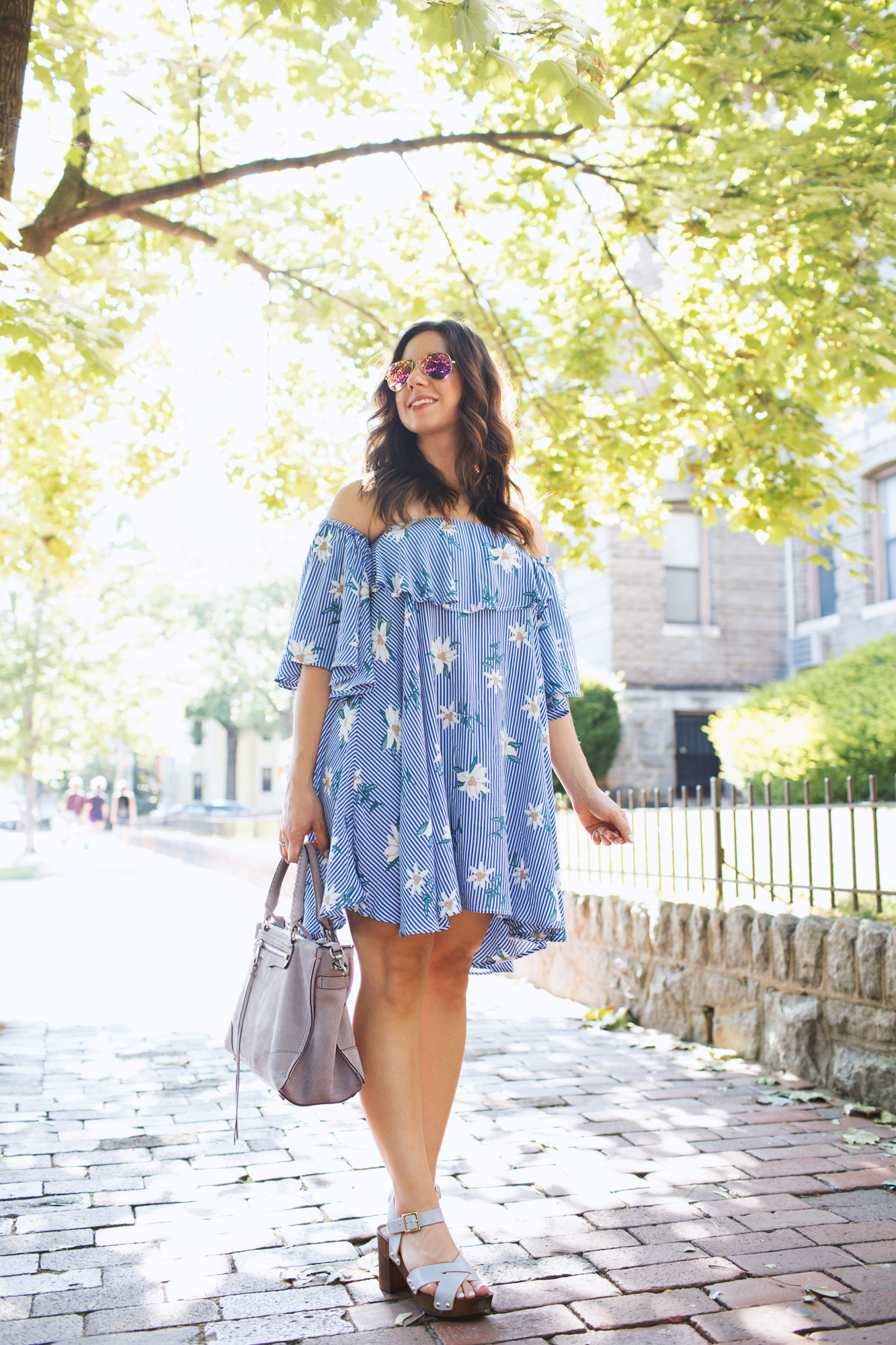 Lifestyle blogger Roxanne of Glass of Glam wearing a Shein floral off the shoulder dress