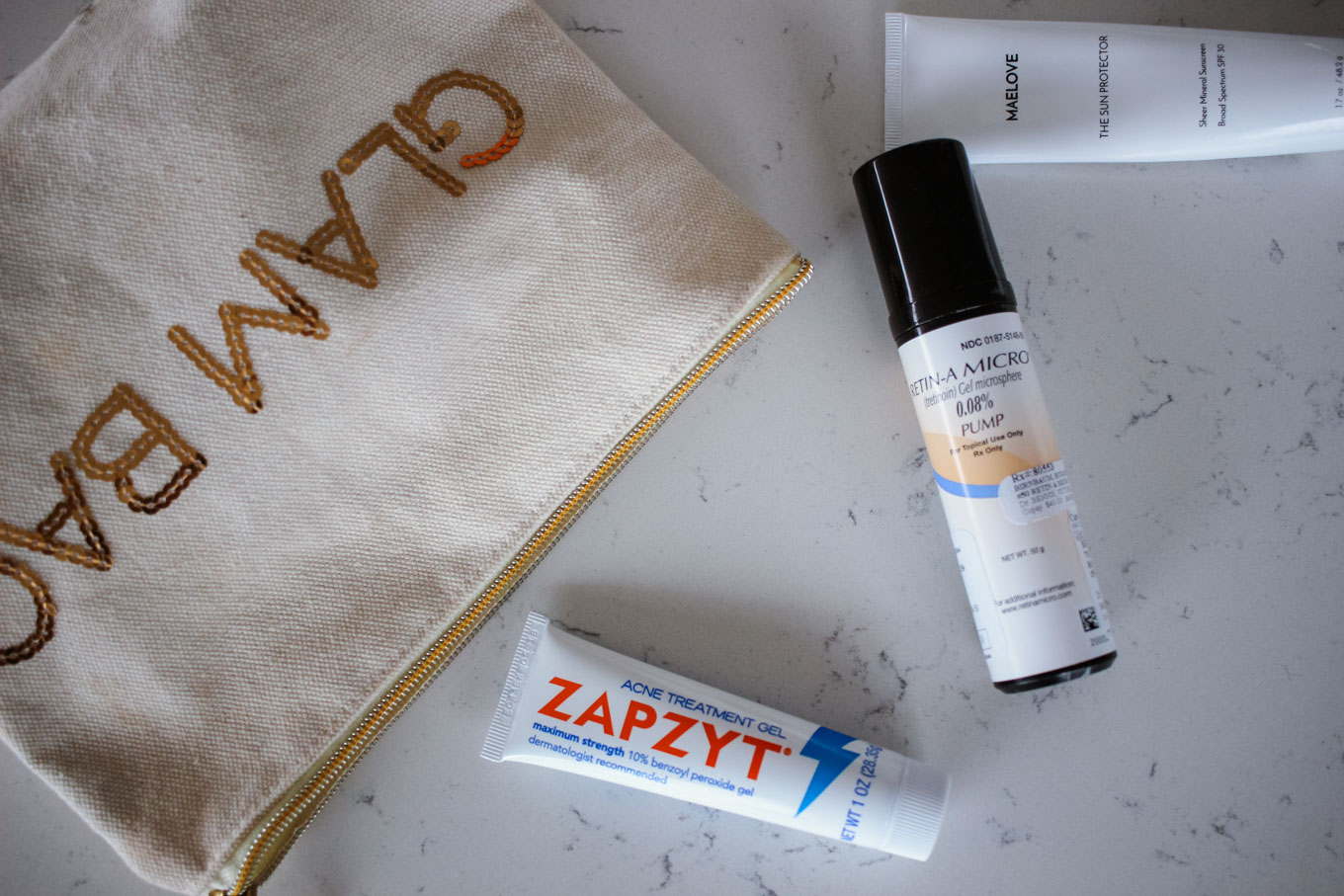 Lifestyle blogger Roxanne of Glass of Glam's acne skincare routine with zapzyt