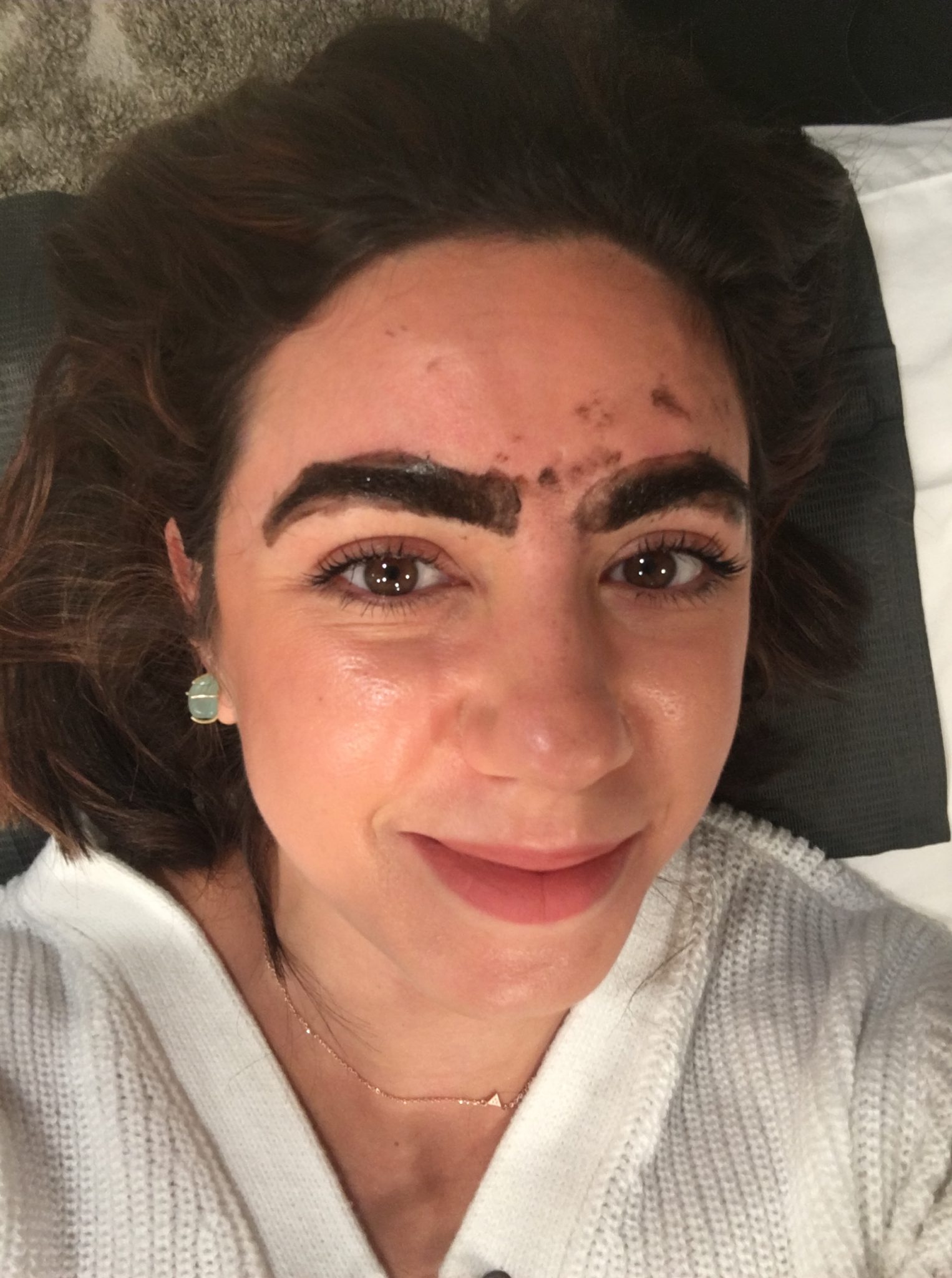 Lifestyle blogger Roxanne of Glass of Glam's eyebrow Microblading experience