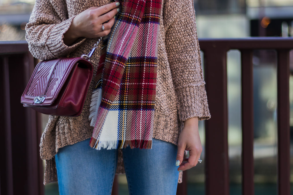 lifestyle blogger Roxanne of Glass of Glam wearing a Gray Monroe sweater, plaid scarf, Rebecca Minkoff bag, Madewell denim, and red slouch boots