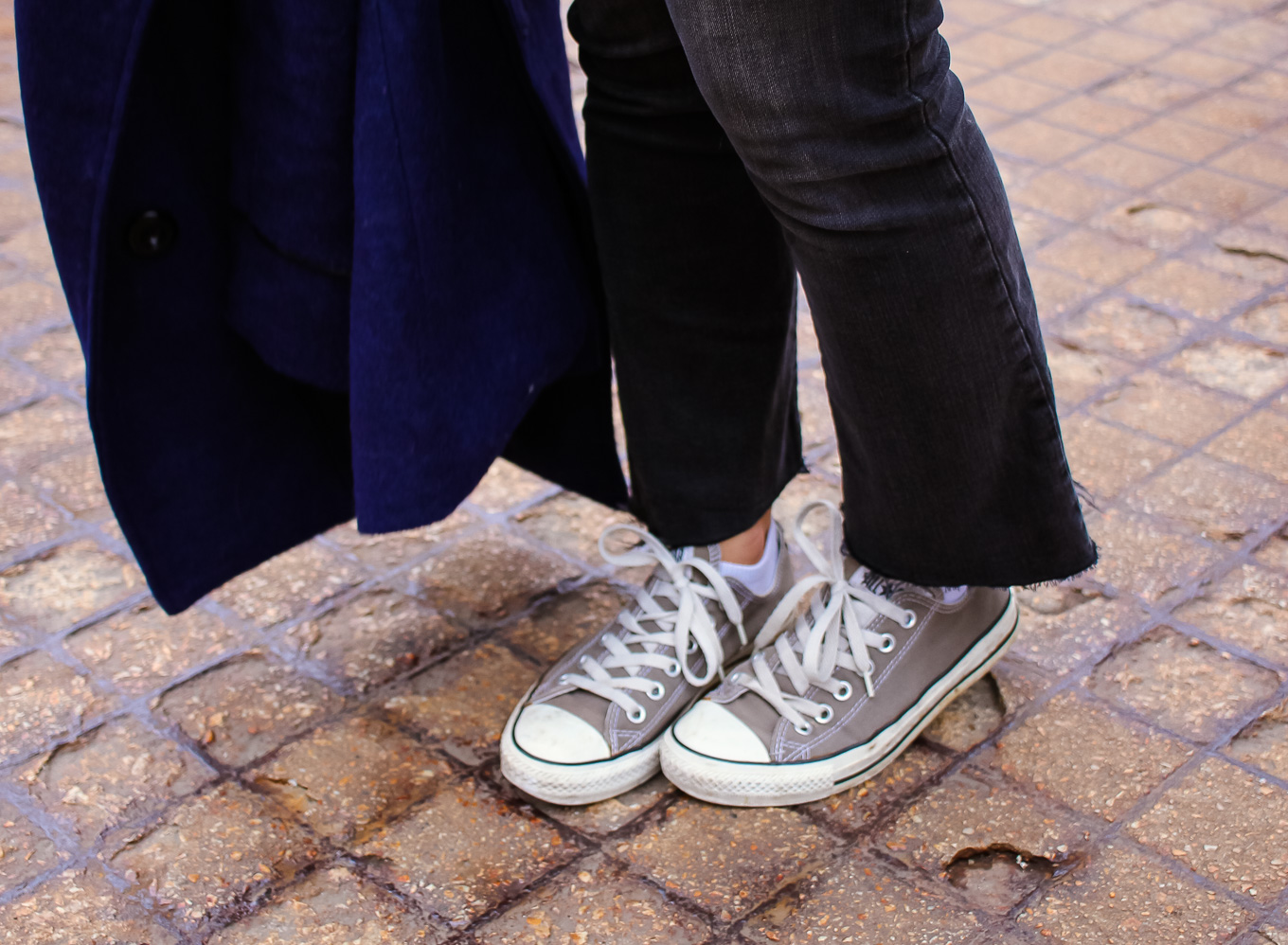 Lifestyle blogger Roxanne of Glass of Glam wearing a Madewell cropped denim, Madewell sweater, converse, a Goyard handbag, and a blue peacoat - Ain't No Party Like A Cropped Denim Party by popular Chicago fashion blogger Glass of Glam