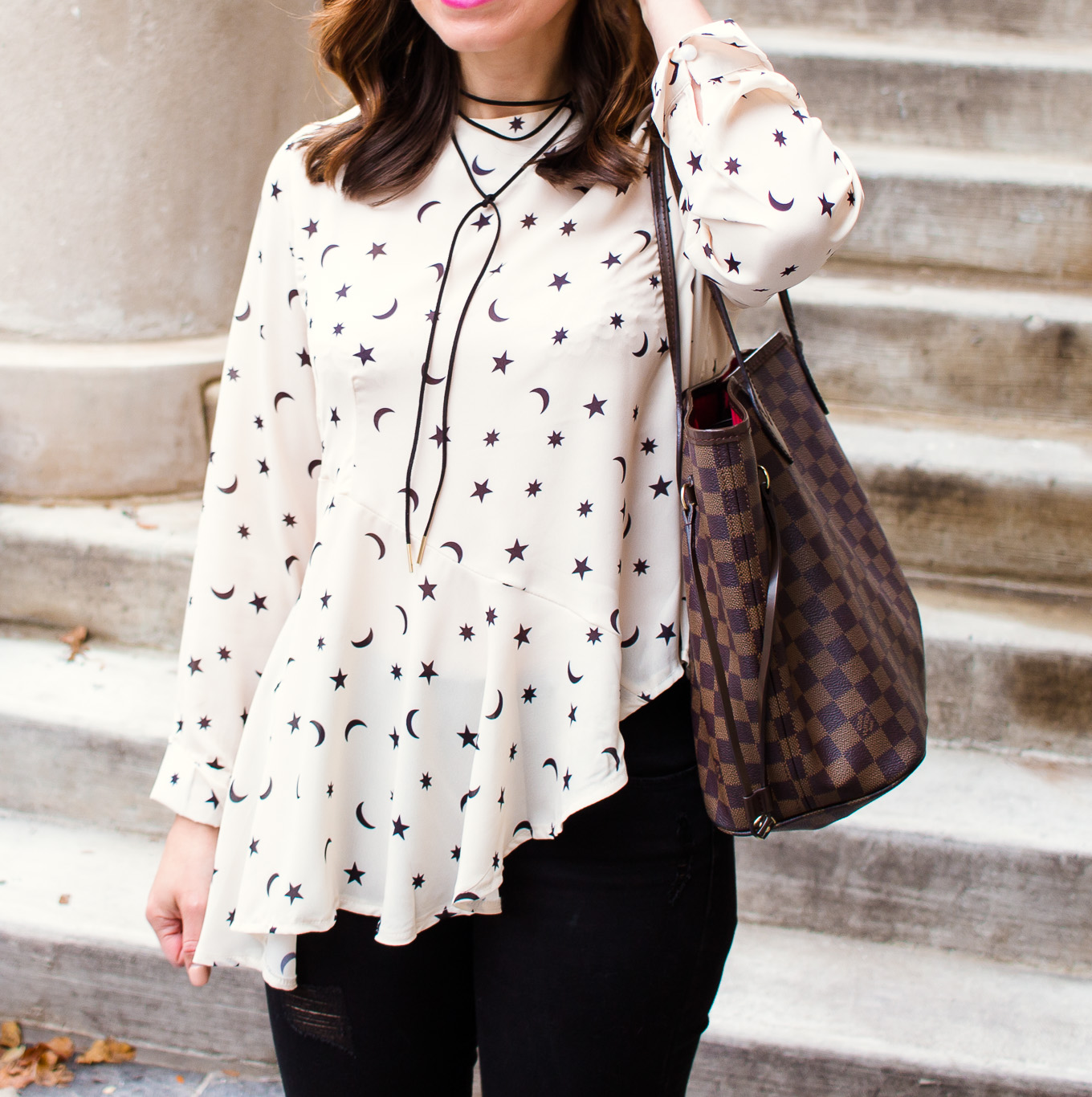 Lifestyle blogger Roxanne of Glass of Glam wearing a star print asymmetrical top, Old Navy denim, and pink combat boots - Asymmetric top with star print by popular Chicago fashion blogger Glass of Glam