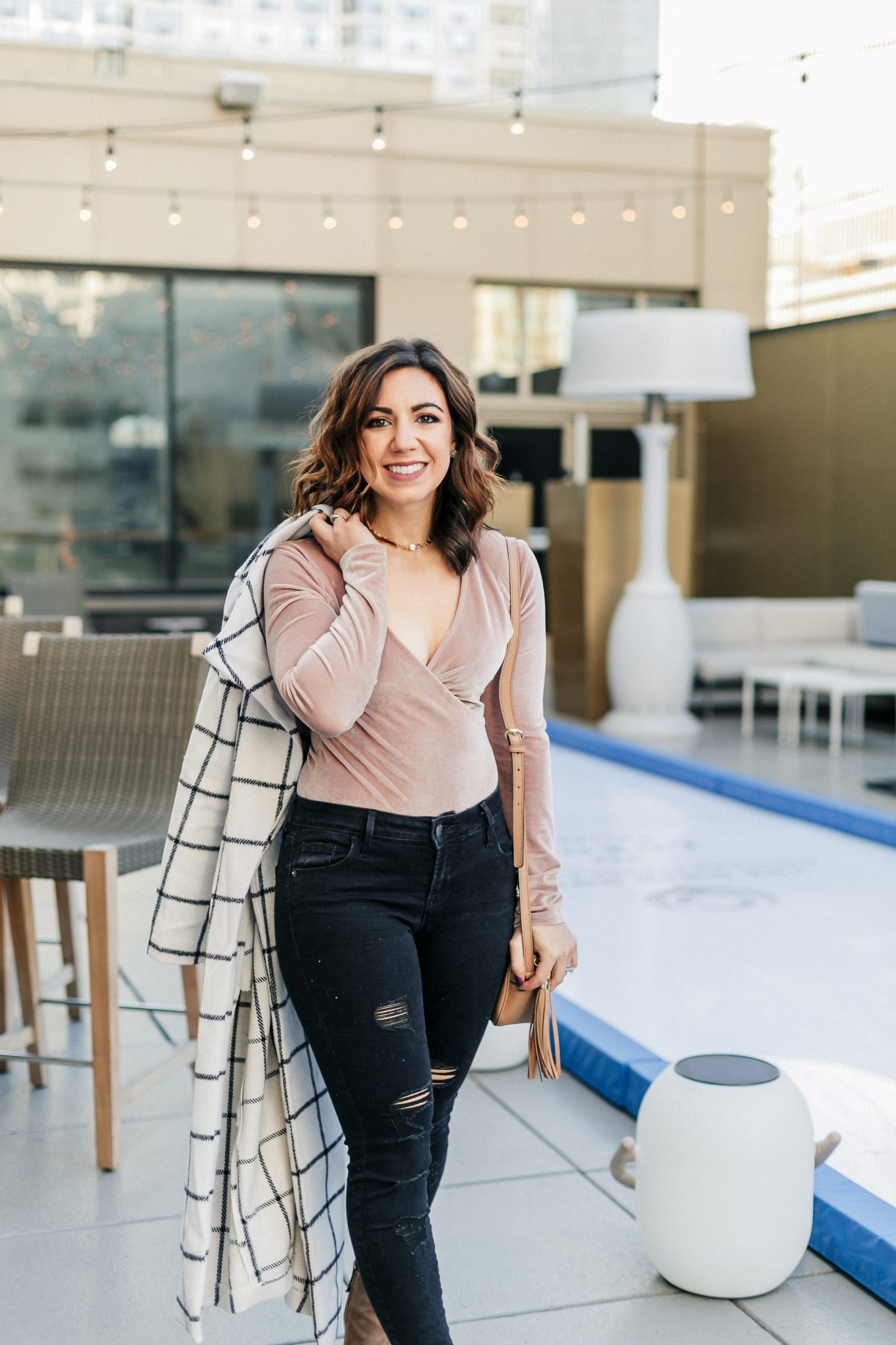 Lifestyle blogger Roxanne of Glass of Glam wearing a windowpane duster coat, velvet bodysuit, distressed denim, and a Gucci soho disco bag - SheIn windowpane duster coat by popular Washington fashion blogger Glass of Glam