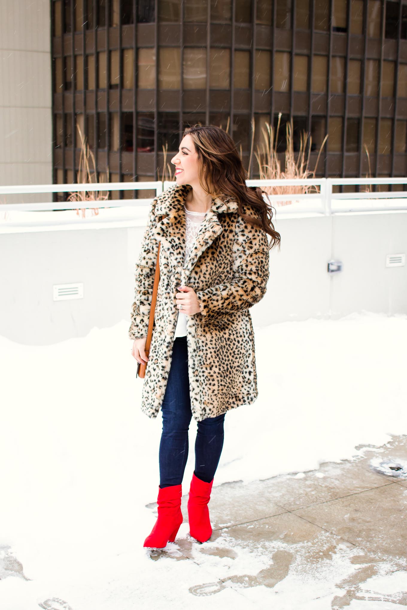Lifestyle blogger Roxanne of Glass of Glam wearing a white lace Shein top, leopard coat, Mott and Bow denim, and red booties. - SheIn White Lace Top outfit by popular Chicago fashion blogger Glass of Glam