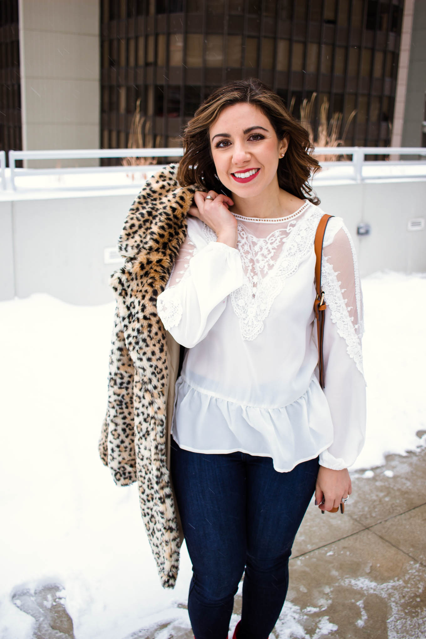 Lifestyle blogger Roxanne of Glass of Glam wearing a white lace Shein top, leopard coat, Mott and Bow denim, and red booties. - SheIn White Lace Top outfit by popular Chicago fashion blogger Glass of Glam