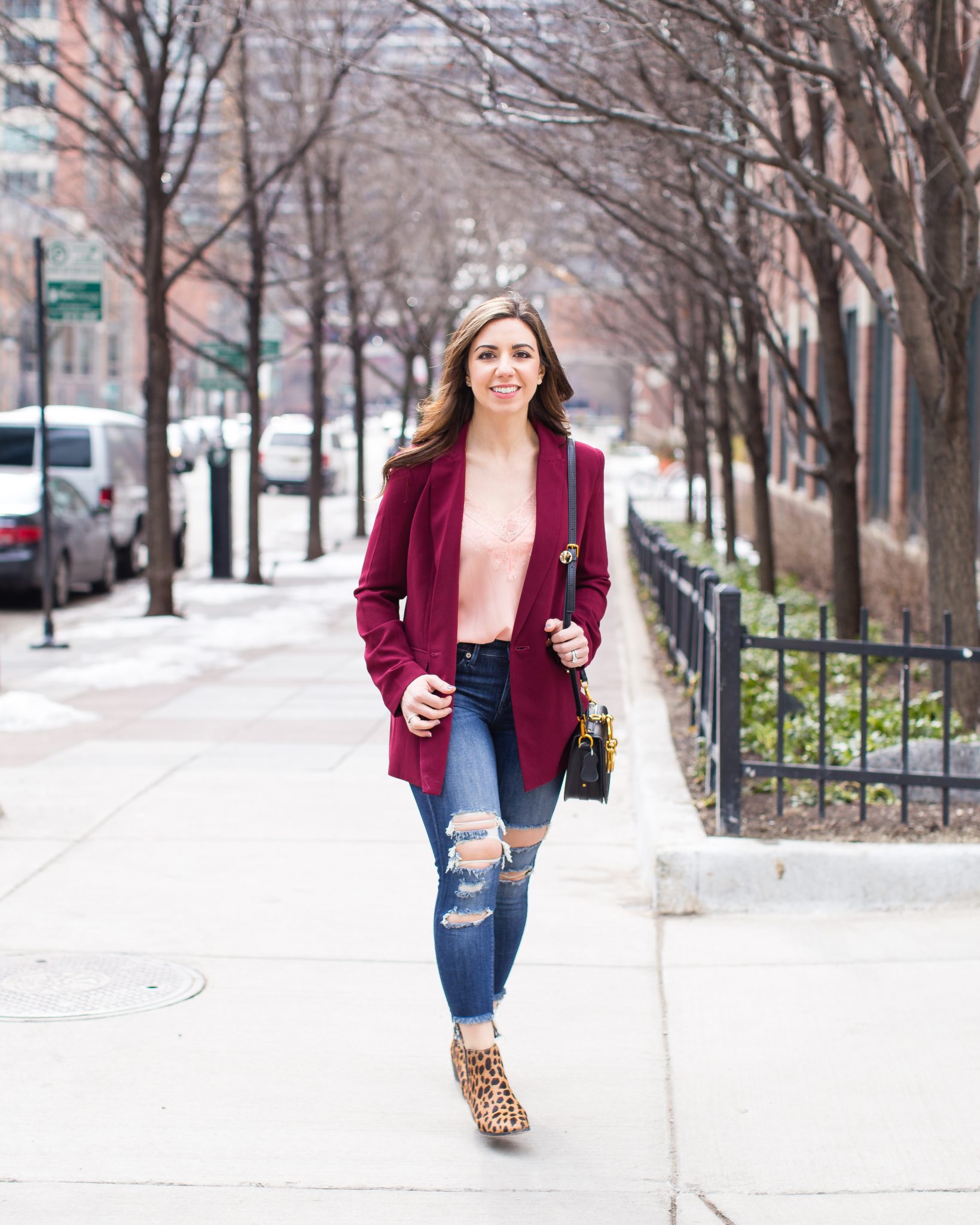 Lifestyle blogger Roxanne of Glass of Glam wearing a burgundy boyfriend blazer, Express denim, leopard booties, lace cami, and a Chloe Nile bag dupe - Nordstrom Burgundy Blazer  by popular Chicago fashion blogger Glass of Glam