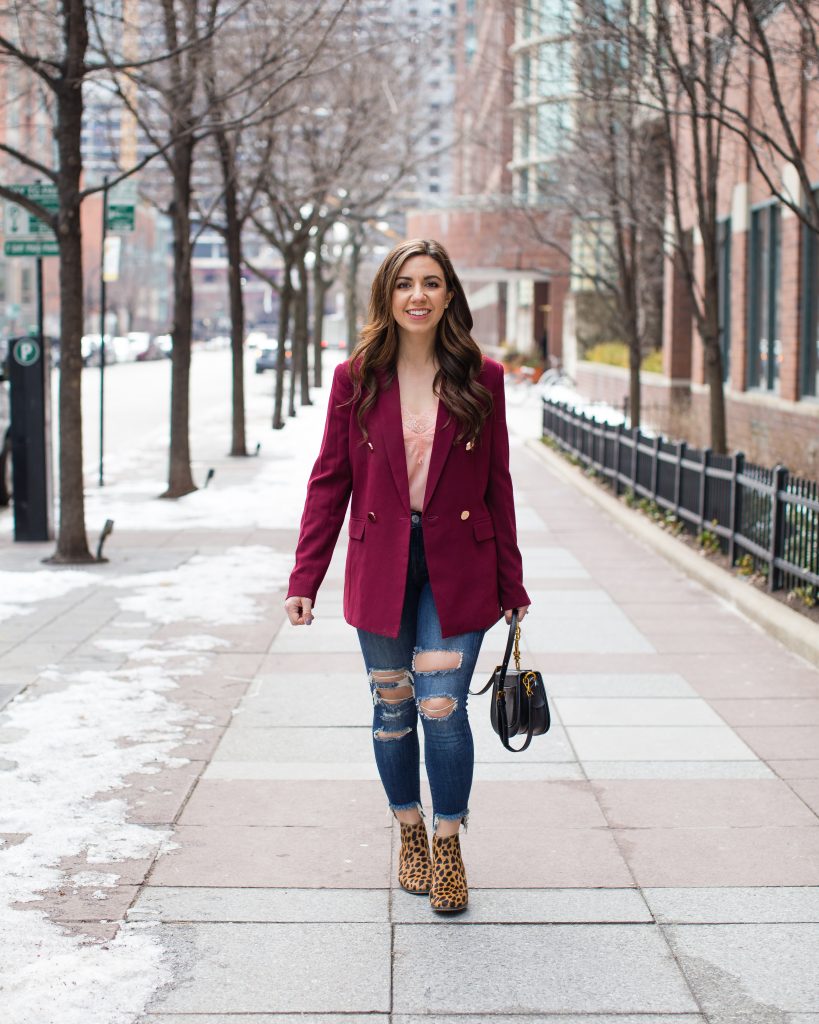 Lifestyle blogger Roxanne of Glass of Glam wearing a burgundy boyfriend blazer, Express denim, leopard booties, lace cami, and a Chloe Nile bag dupe - Nordstrom Burgundy Blazer by popular Chicago fashion blogger Glass of Glam