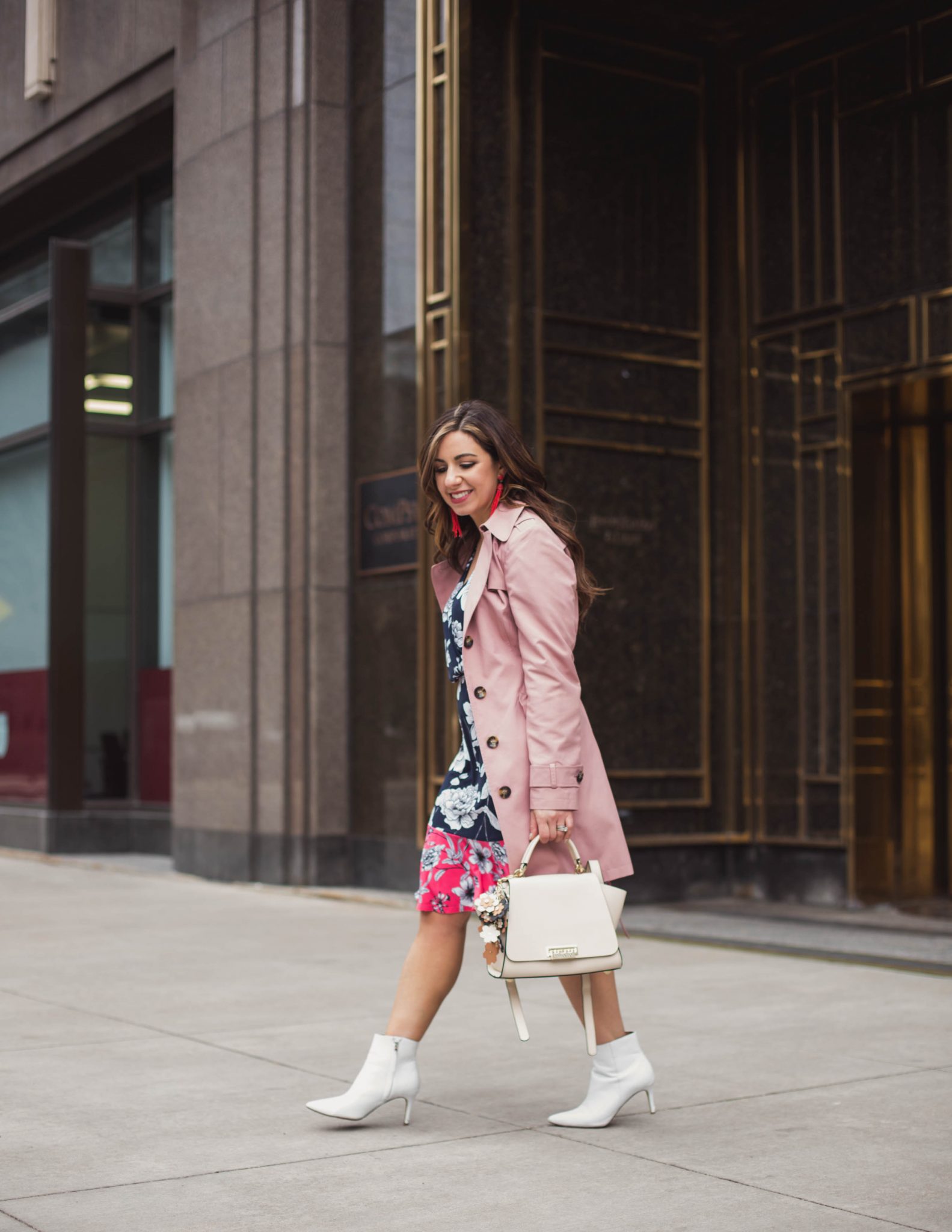 Lifestyle blogger Roxanne of Glass of Glam wearing an Eliza J dress, white booties, Zac Posen bag, and a pink trench coat - Spring Trench Coats styled by popular Chicago fashion blogger Glass of Glam