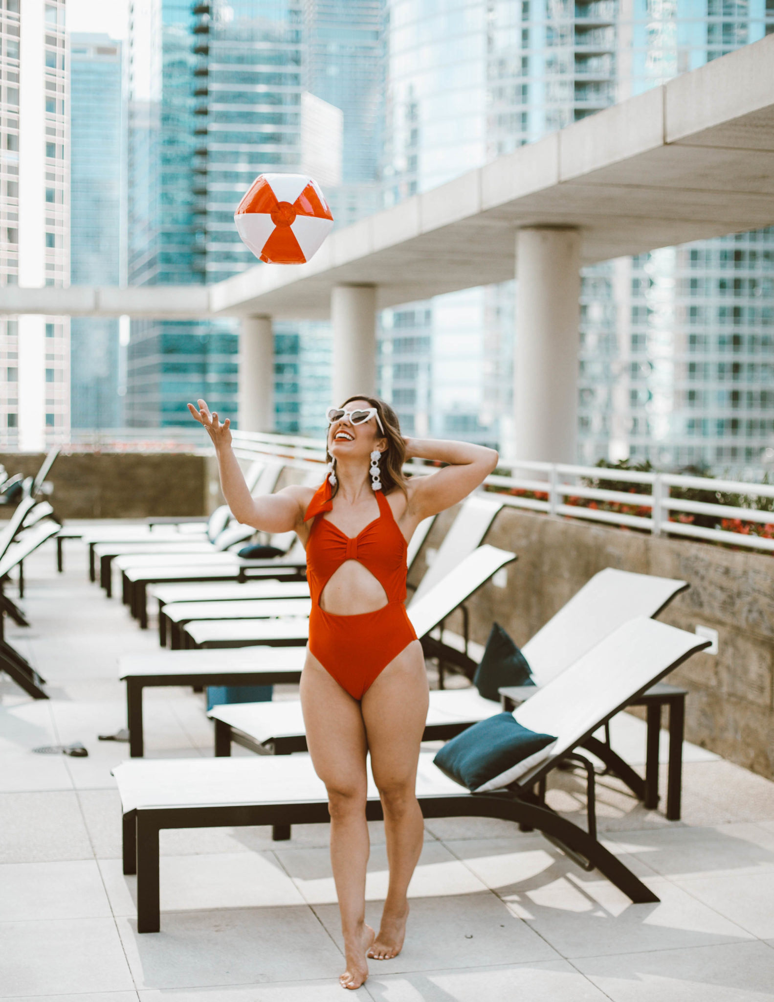Life's a Beach: Red Swimsuit - Introducing The Magnificent 8 featured by popular Chicago fashion blogger Glass of Glam