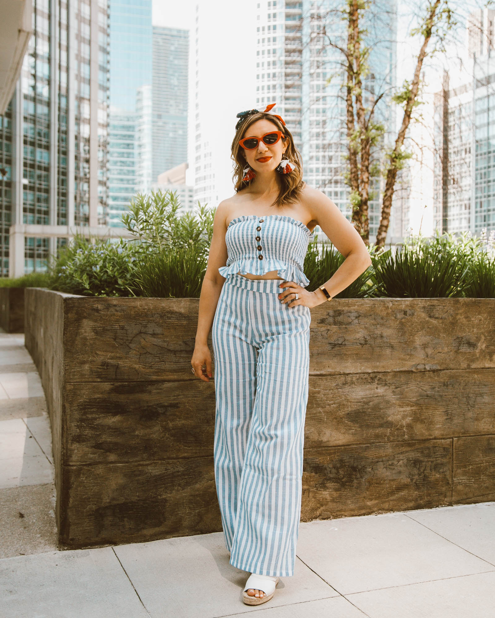 Memorial Day Weekend Deals and Sales featured by top US fashion blog, Glass of Glam: image of a woman wearing a striped 2 piece set