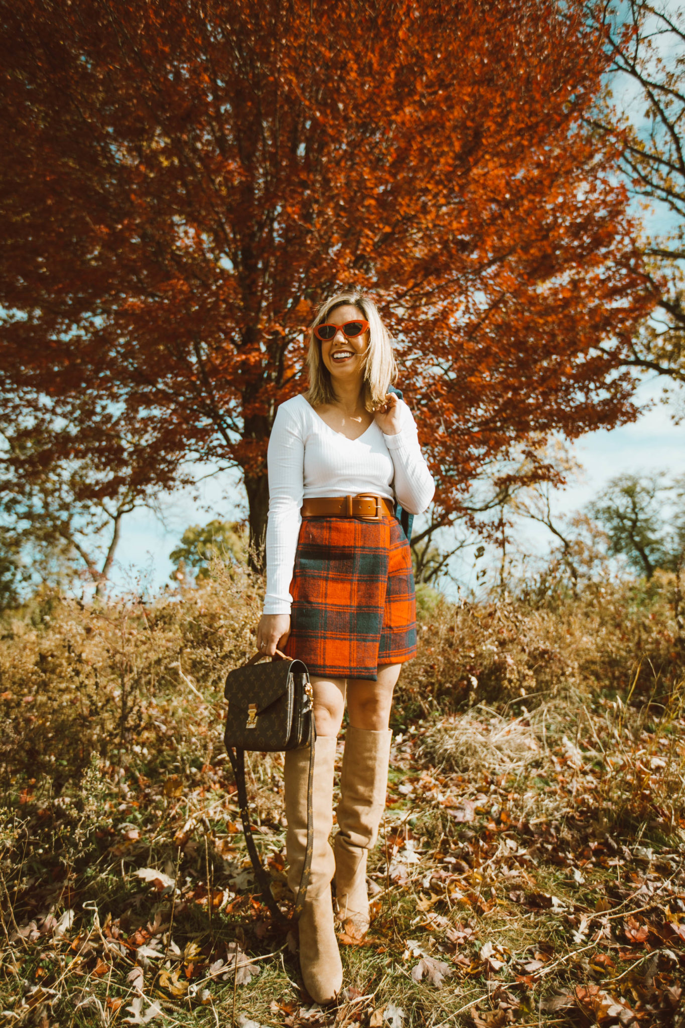 SheIn Winter Picks featured by top US fashion blog, Glass of Glam: image of a woman wearing a SheIn paid skirt, BP V Neck tee, Sam Edelman knee high boots, Halogen stretch belt, Chadwicks of Boston boyfriend blazer, Louis Vuitton bag and ASOS cat eye red sunglasses