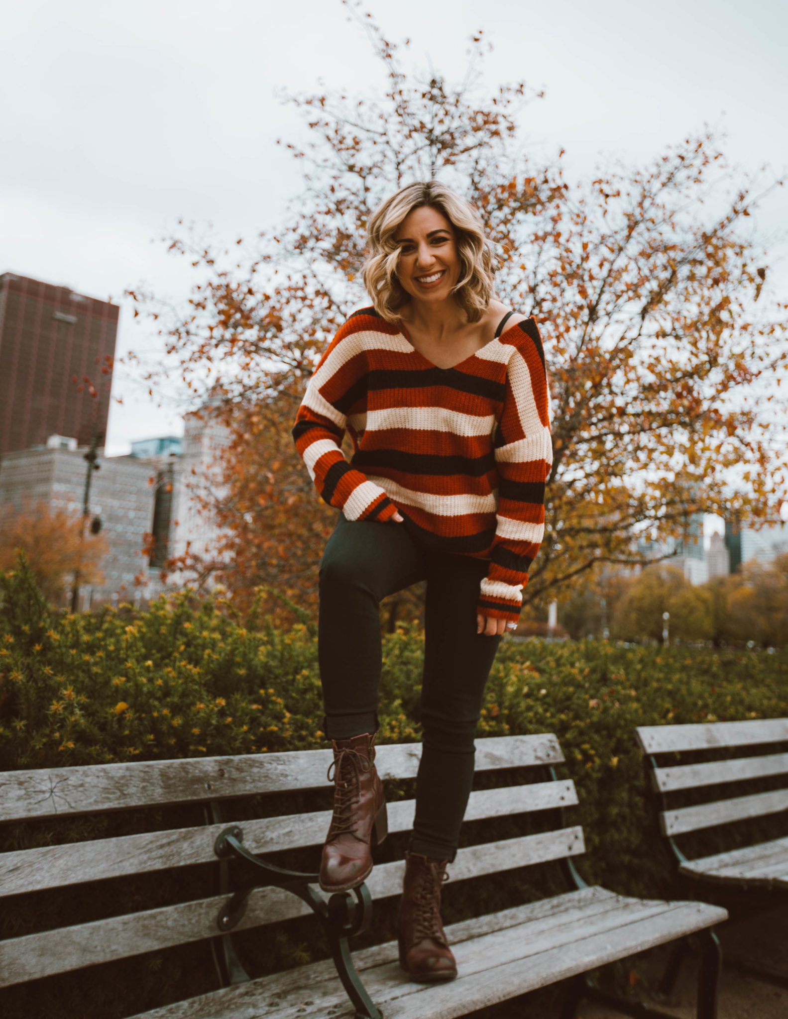 Thanksgiving Outfit Ideas featured by top Chicago fashion blog, Glass of Glam: blonde woman wearing VICI sweater, Liverpool jeans, Patricia Nash boots, Option for Less Liptstick
