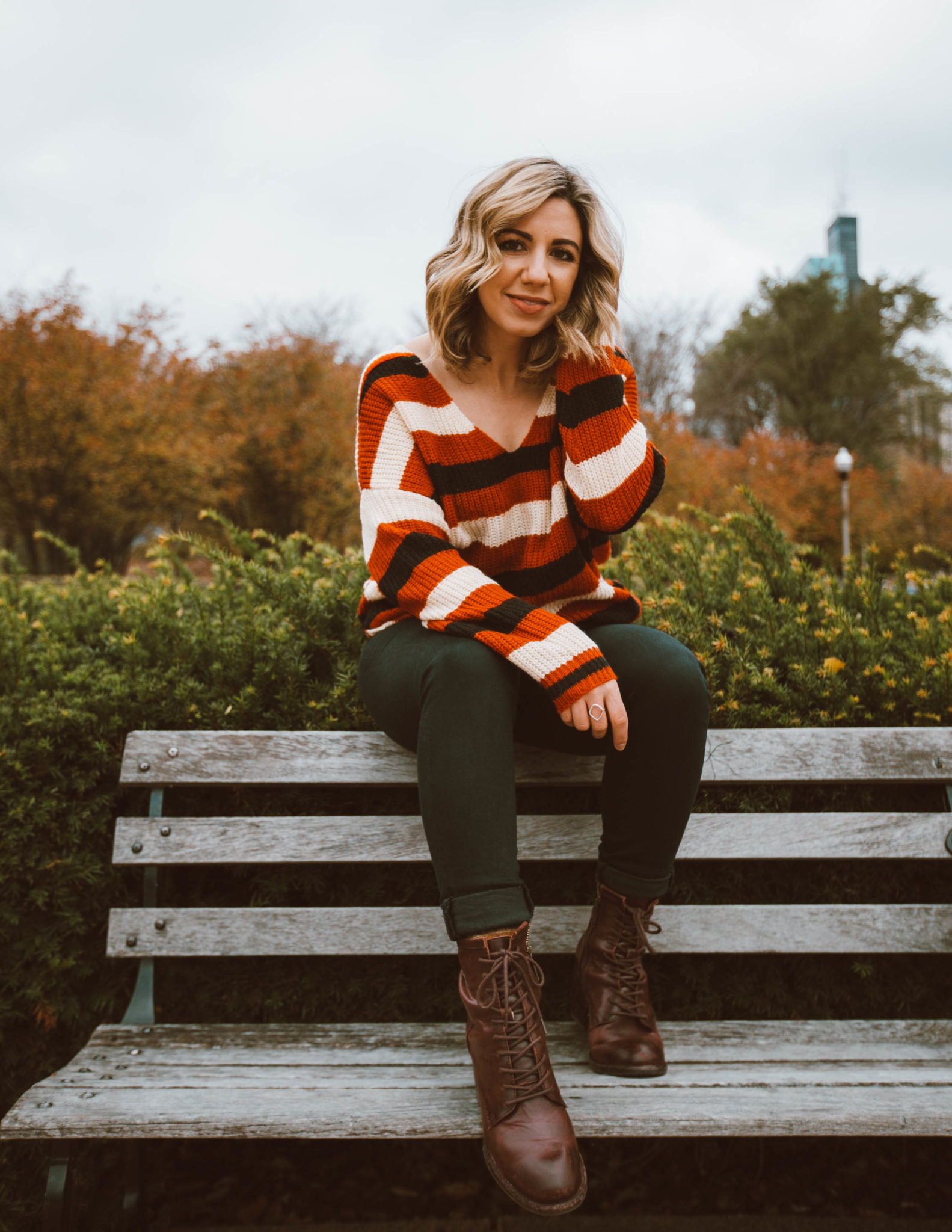 Thanksgiving Outfit Ideas featured by top Chicago fashion blog, Glass of Glam: blonde woman wearing VICI sweater, Liverpool jeans, Patricia Nash boots, Option for Less Liptstick