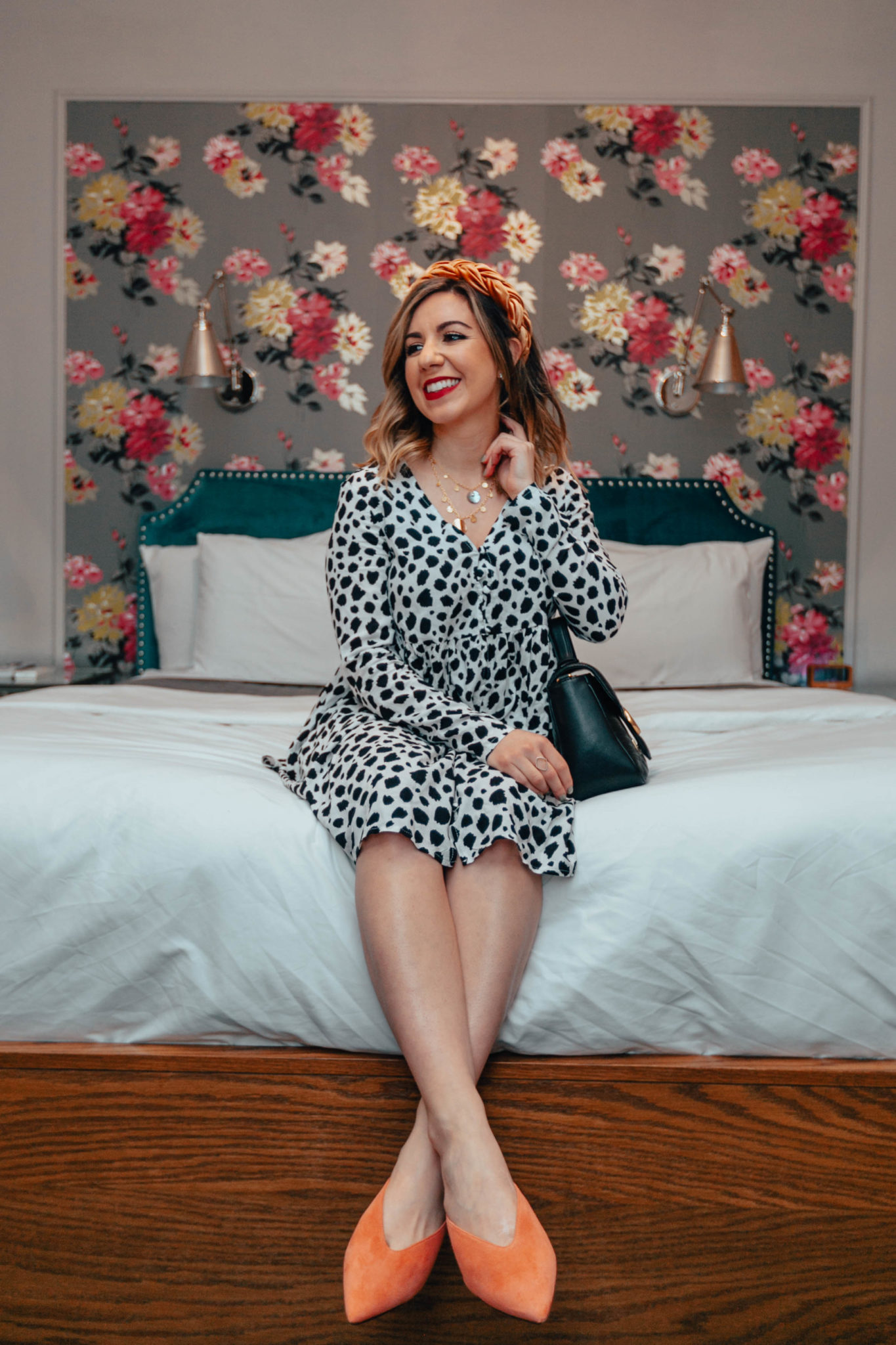 ASOS Leopard Dress styled by top US fashion blog, Glass of Glam: image of a woman wearing an ASOS leopard dress, Sole Society mules, breaded velvet headband, Gucci Small Marmont and ETTIKA necklace