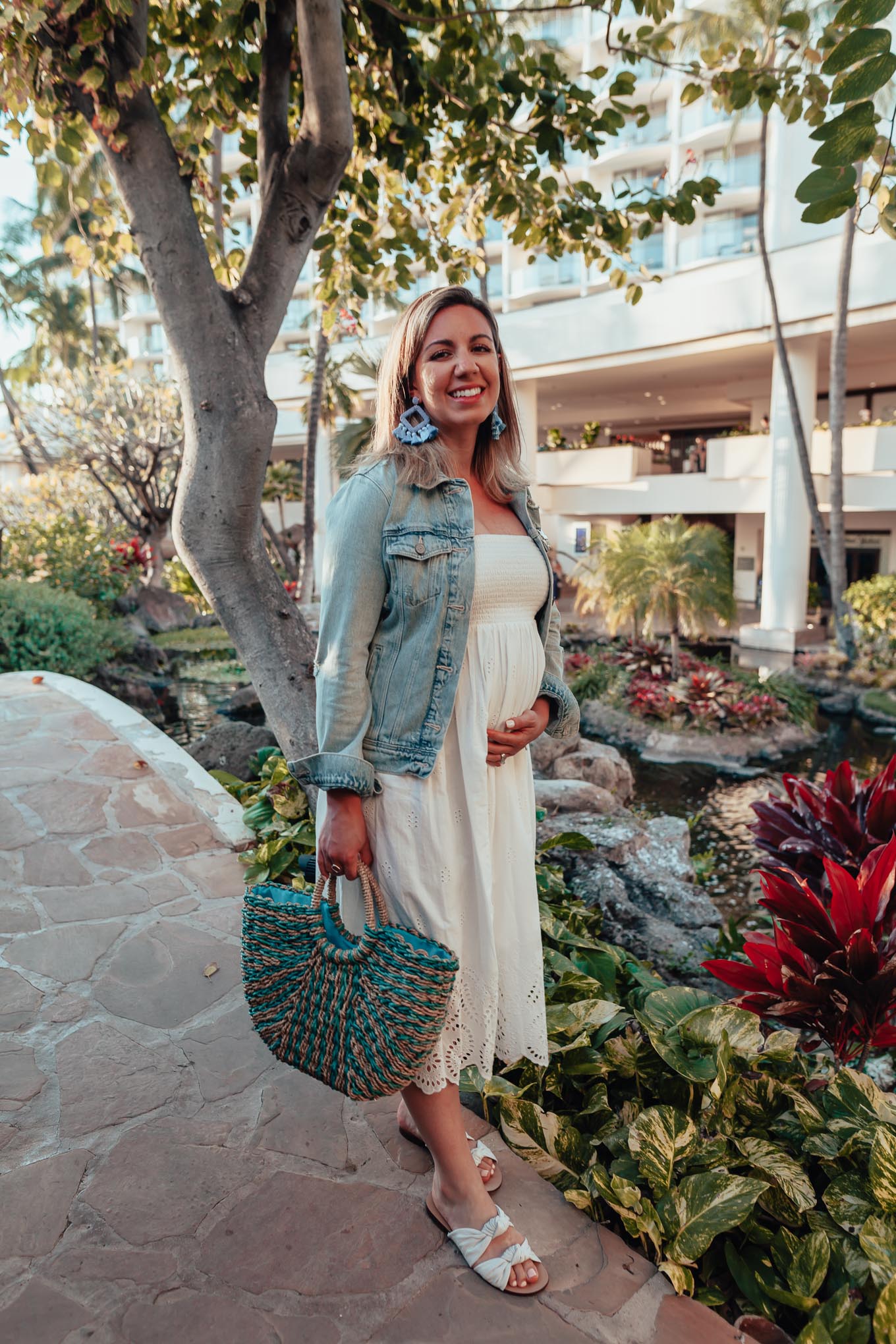 Shopbop sale maternity favorites featured by top US fashion blog, Glass of Glam: image of a woman wearing an Ingrid & Isabel dress, Splendid flat sandals, Old Navy denim jacket, and BAUBLEBAR statement earrings