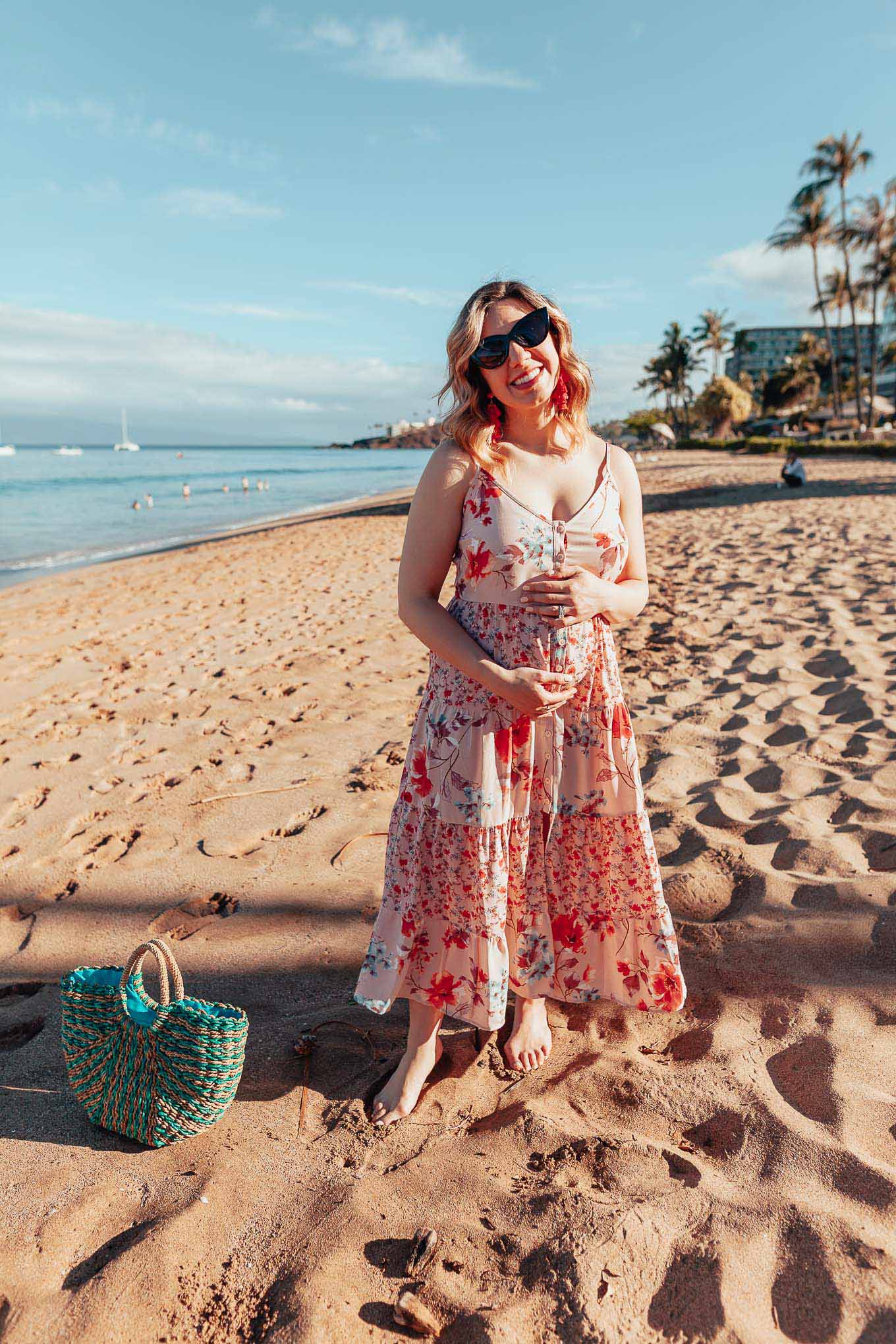 Maui Packing List and outfit round up featured by top US fashion blog, Glass of Glam: image of a woman wearing a floral maxi dress from Target