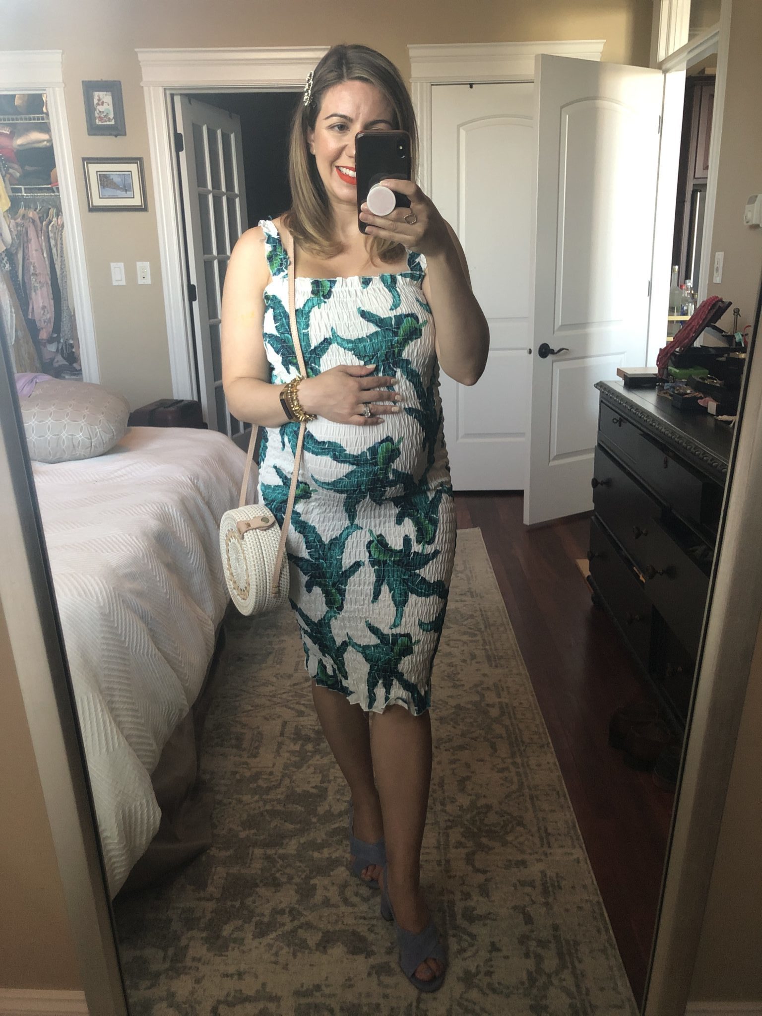 Summer maternity-friendly Shein clothing featured by top US fashion blog, Glass of Glam: image of a pregnant woman wearing a SheIn tropical print dress