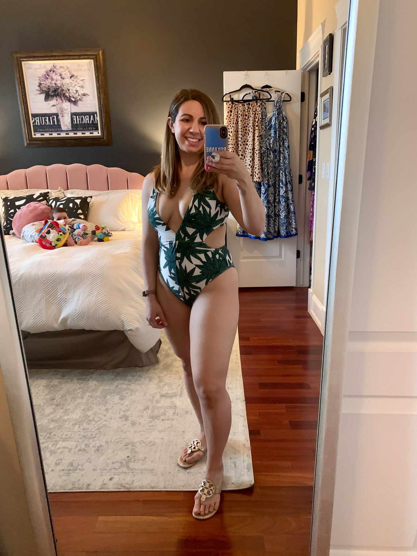 At Home Swimwear Try On by popular Chicago fashion blog, Glass of Glam: image of a woman standing in her master bedroom and wearing a Amazon L'amore Women's Deep Plunge High Waisted One Piece Swimsuit.