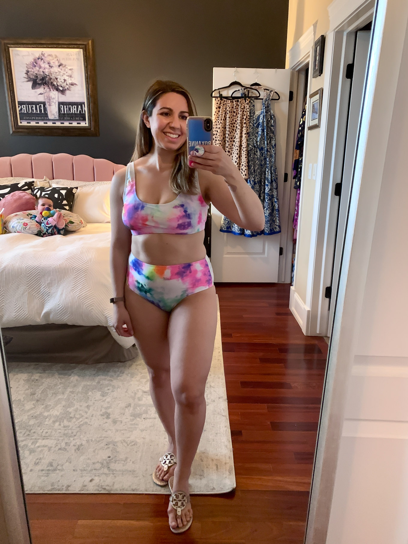 At Home Swimwear Try On by popular Chicago fashion blog, Glass of Glam: image of a woman standing in her master bedroom and wearing a SheIn Tie Dye High Waisted Bikini Swimsuit.