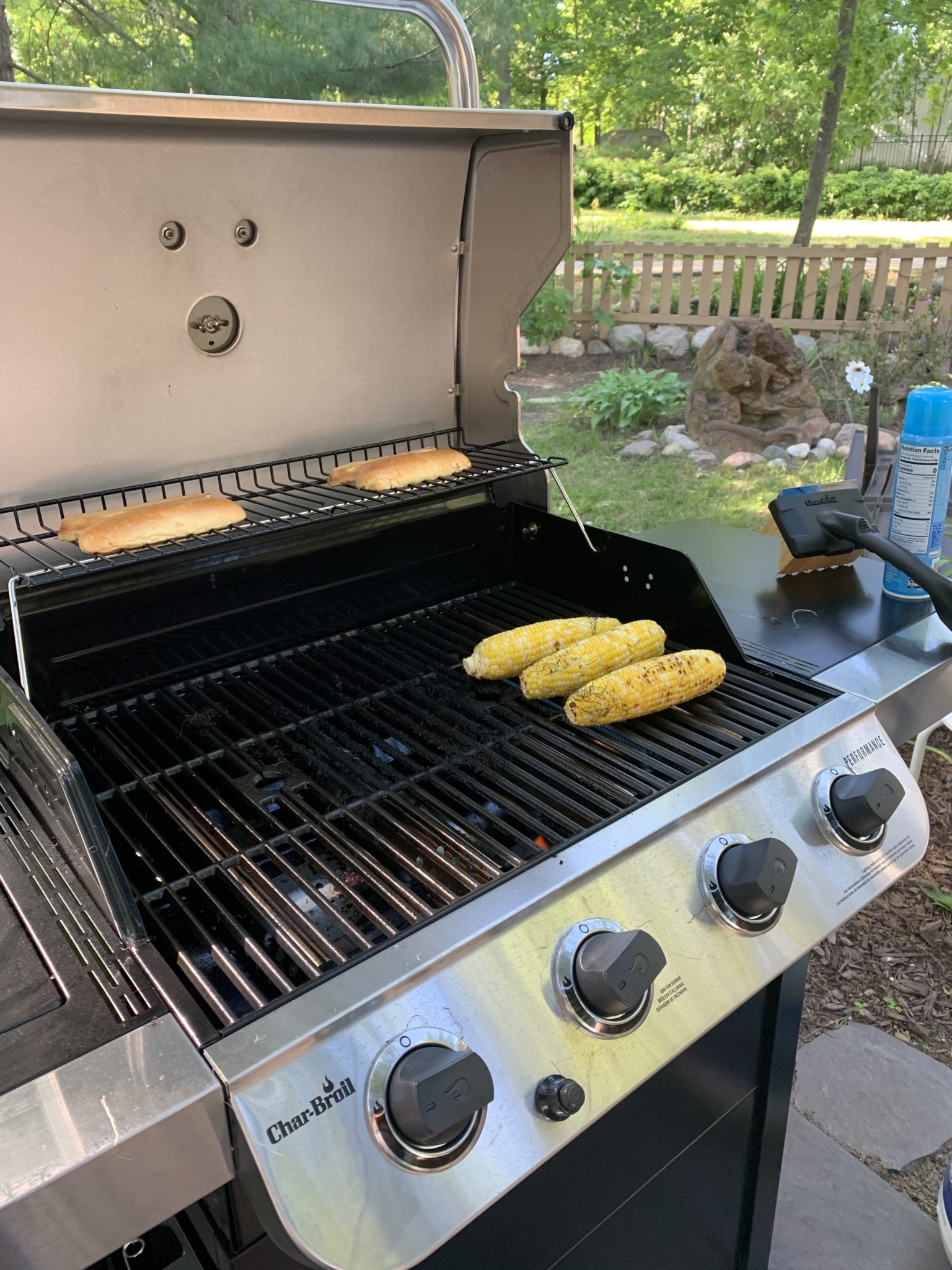 Traverse City by popular Chicago travel blog, Glass of Glam: image of corn cooking on a grill.