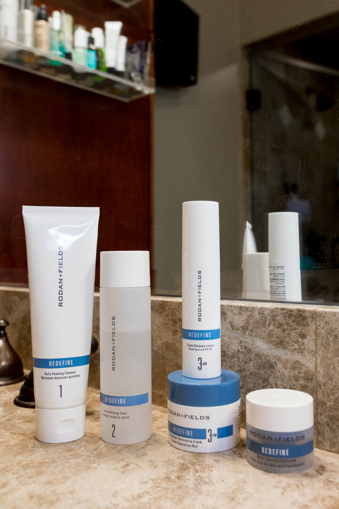 Rodan and Fields Redefine Regimen by popular Chicago beauty blog, Glass of Glam: image of the Rodan and Fields Redefine regimen products. 