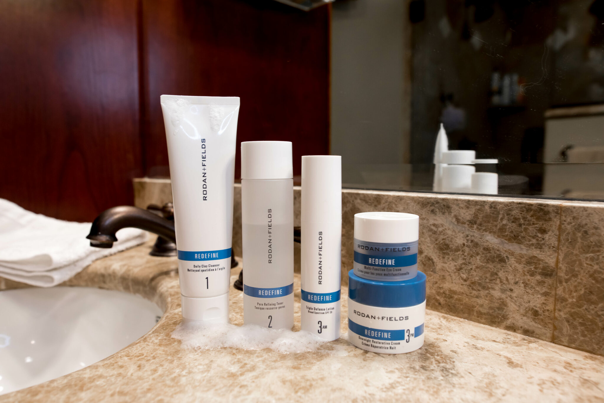 Rodan and Fields Redefine Regimen by popular Chicago beauty blog, Glass of Glam: image of the Rodan and Fields Redefine regimen products. 
