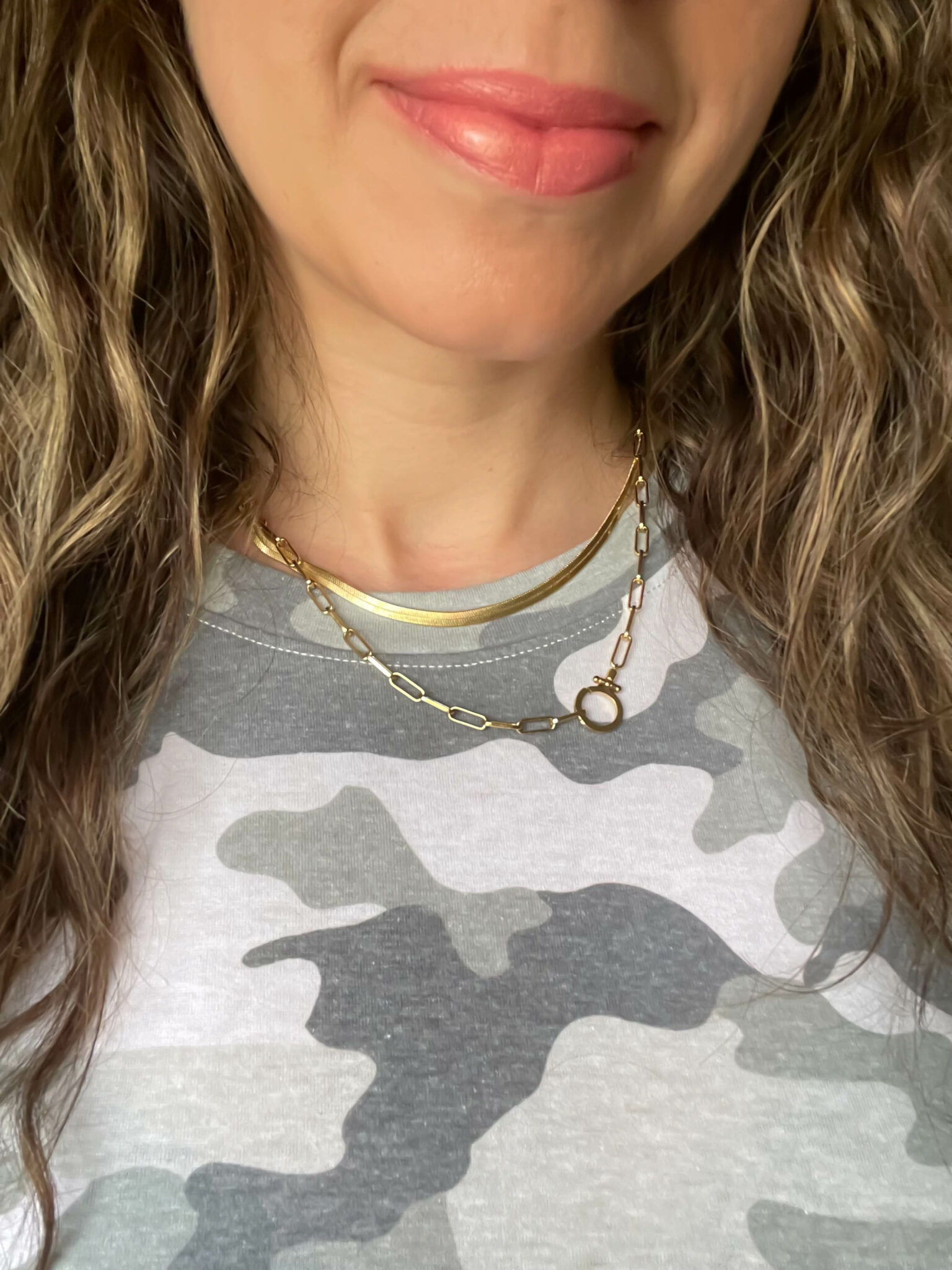 Gorjana Stacking Necklaces by popular Chicago fashion blog, Glass of Glam: image of a woman wearing a Camo shirt and gold Gorjana stacking necklaces. 